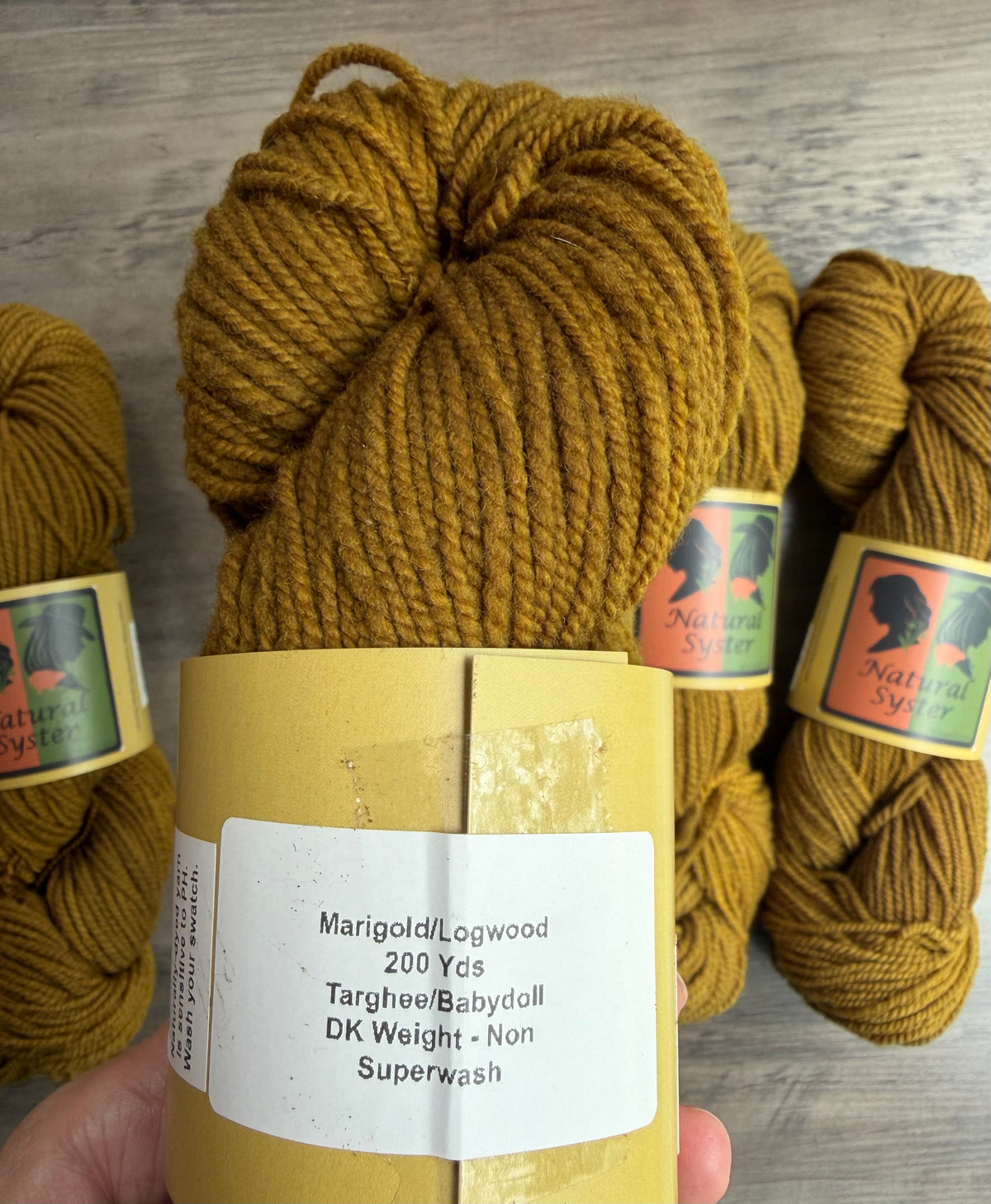 Targhee/Babydoll Marigold/Logwood DK
