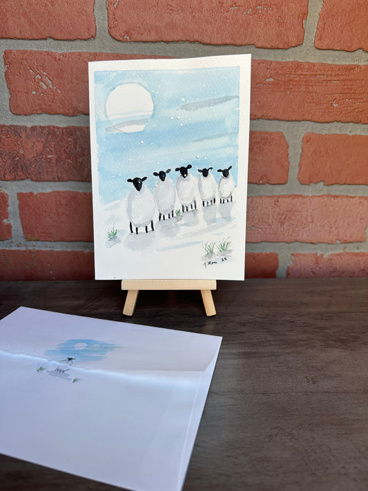 Snow Falling on Sheep